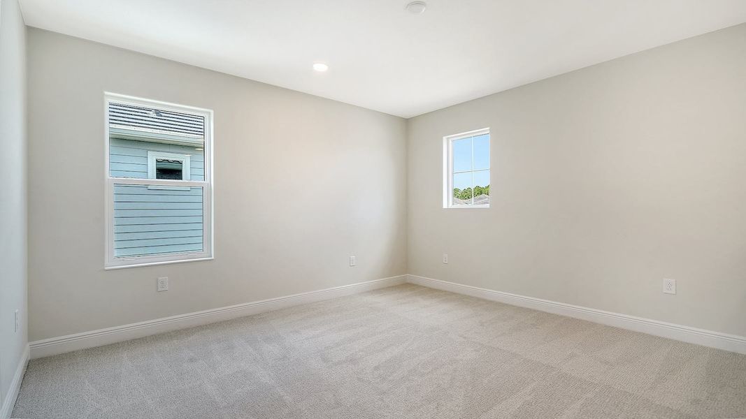 Spacious, unfurnished interior of a new home in Palm Grove Real Estate and Homes for Sale in Lakewood Ranch, FL - Neal Communities, Bradenton (Image 10).