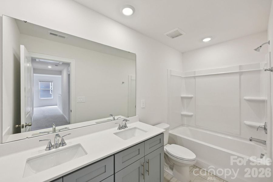 Photo is not of the actual home, but is an inspirational photo of builder’s model home and may depict options, furnishings, and/or decorator features that are not included Photo is not of the actual home, but is an inspirational photo of builder’s model home and may depict options, furnishings, and/or decorator features that are not included