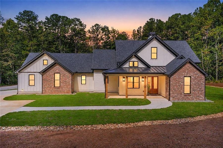 Front exterior of a new home in , Canton, GA, highlighting curb appeal (Image 25).