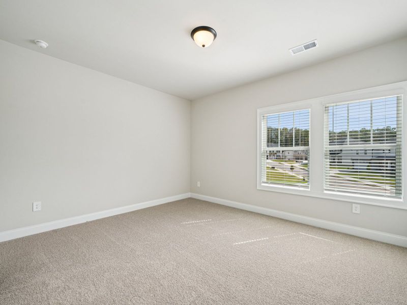 Spacious, unfurnished interior of a new home in Vines at Mill Creek - Legacy Series, Braselton (Image 16).