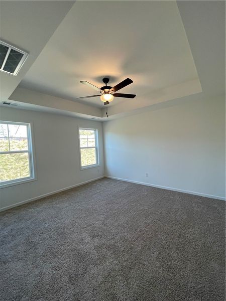 This interior offers expansive vaulted ceilings an