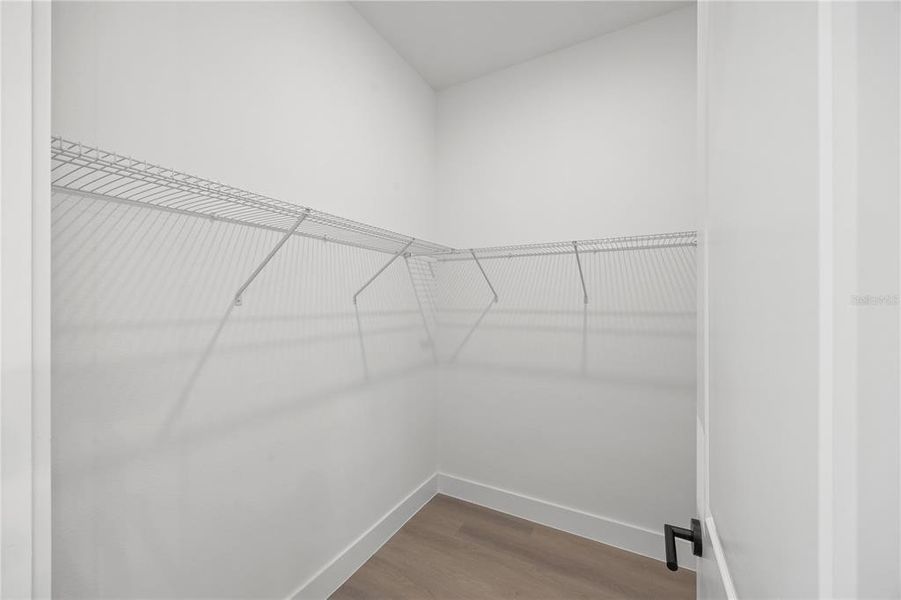 Walk in closet (1 of 2 for Primary Bedroom) Walk in closet (1 of 2 for Primary Bedroom)