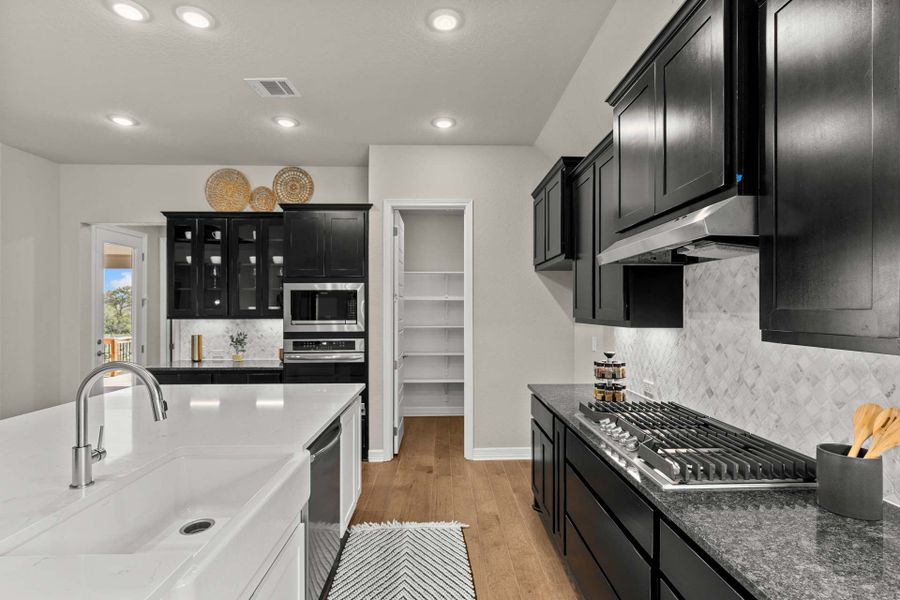 Representative furnished interior of a home built from the The Summerlin A by Davidson Homes LLC in Potranco Oaks, Castroville (Image 20).