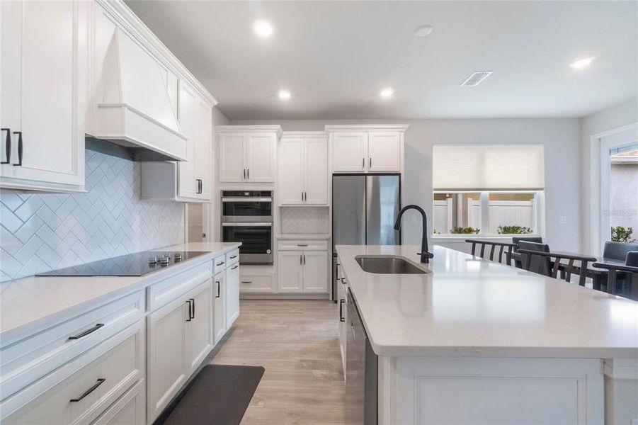 gourmet kitchen with smart appliances