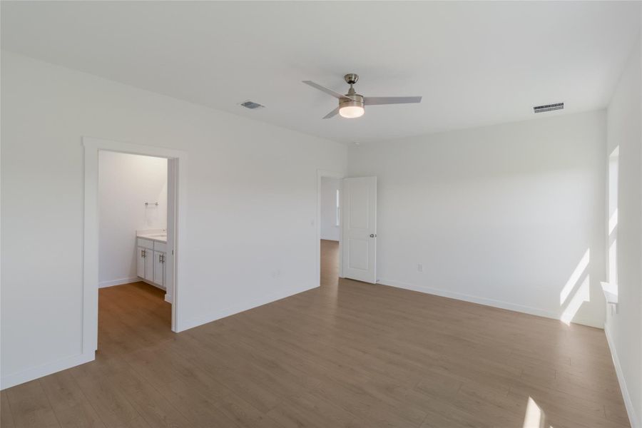 Spacious, unfurnished interior of a new home in Trails at Wildhorse, Austin (Image 22).