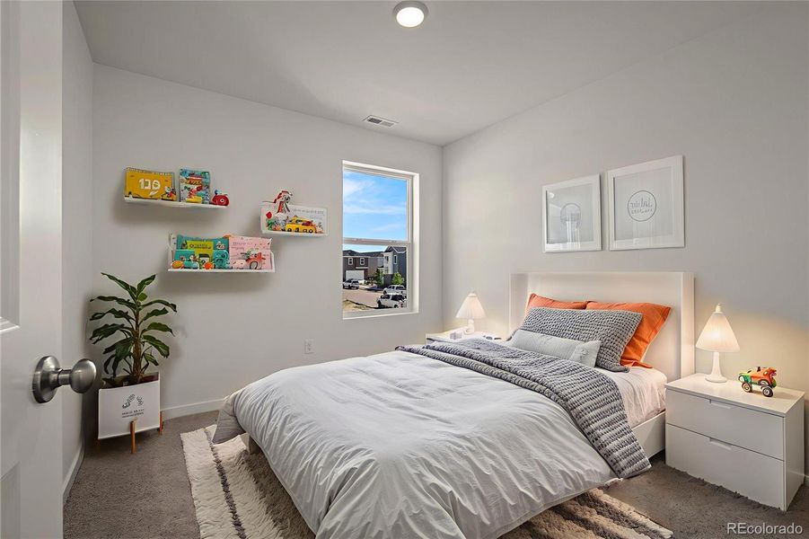 Furnished interior view inside a new home in Revel Crossing at Wolf Ranch – The Ascent Collection, Colorado Springs (Image 11).