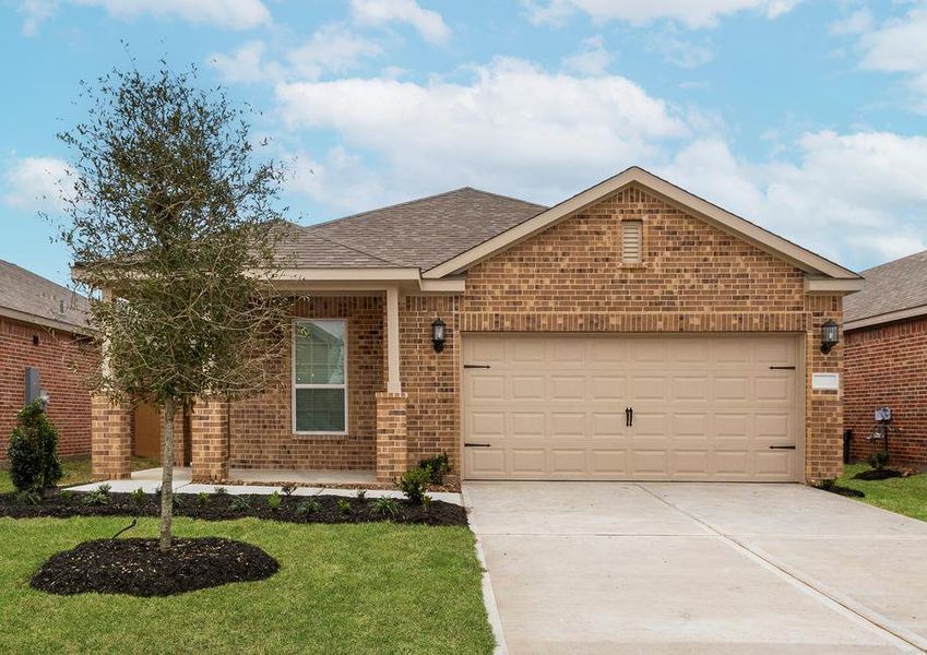 This home has a 2-car garage and gorgeous stone detailing.