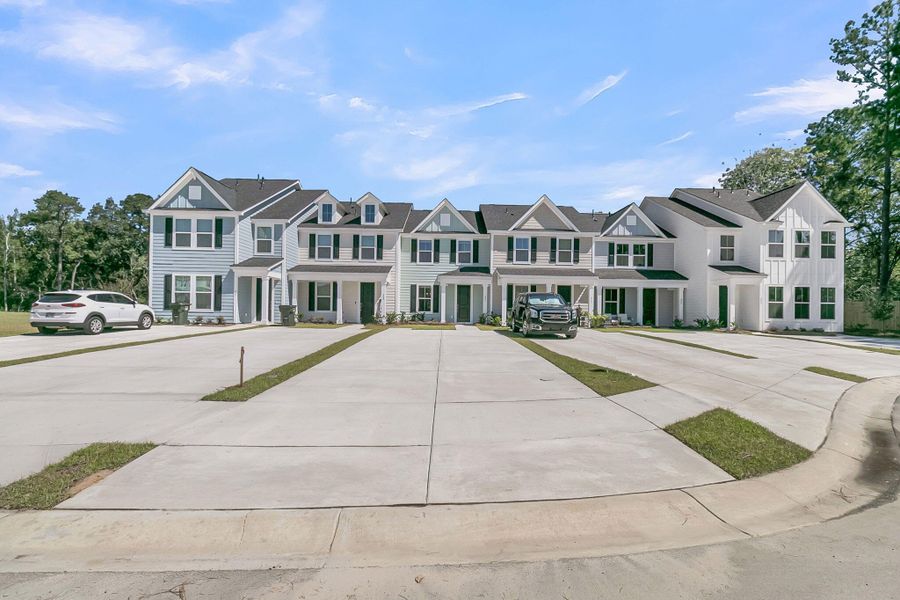 Front exterior of a new home in Abbey Walk, Moncks Corner, SC, highlighting curb appeal (Image 30).