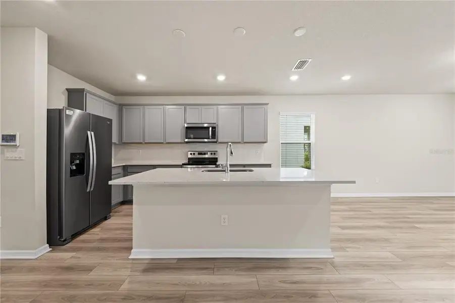 Furnished interior view inside a new home in EverBe, Orlando (Image 7).