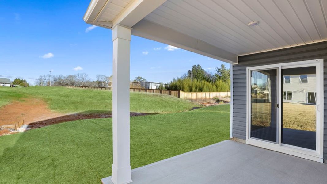 Exterior details and patio area of a home in Bentley Park, Greenwood (Image 24).