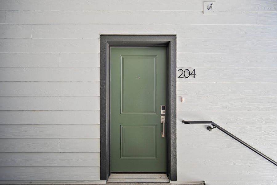 Exterior details and patio area of a home in Lyric at RidgeGate Condos, Lone Tree (Image 24).