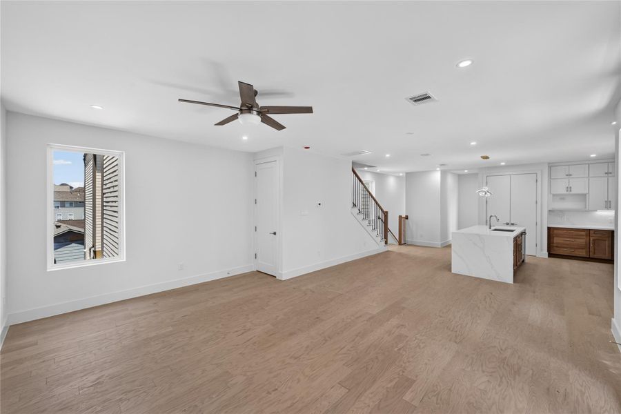 Spacious living room area that's opened to the kitchen and dinning area Spacious living room area that's opened to the kitchen and dinning area