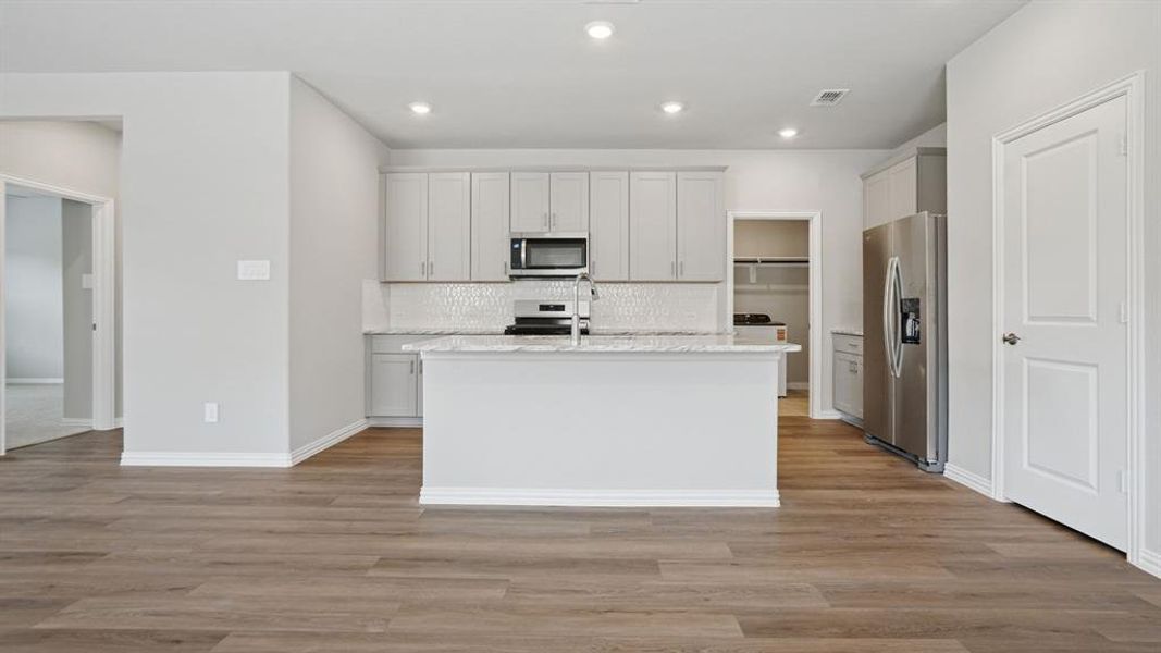 Photo is not of the actual home, but is an inspirational photo of builder’s model home and may depict options, furnishings, and/or decorator features that are not included.