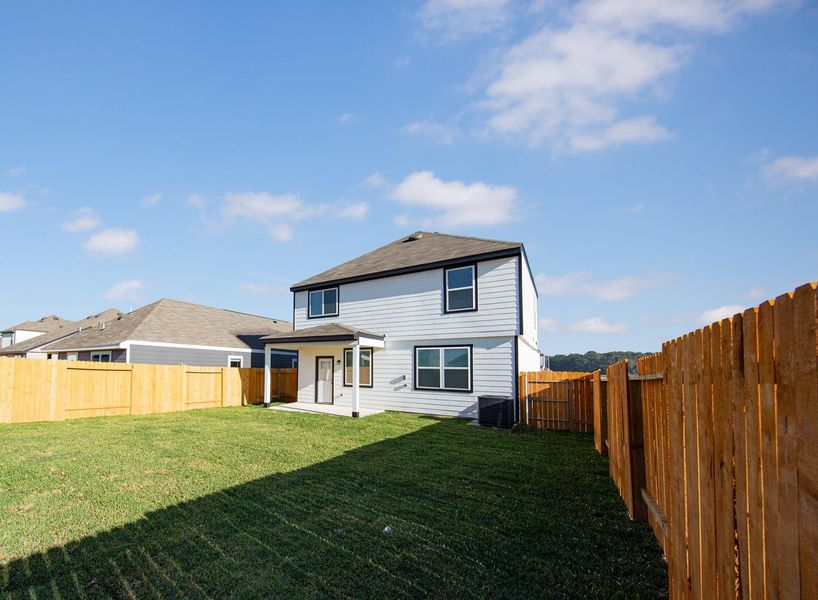 Exterior details and patio area of a home in Wayside Village, Houston (Image 3).