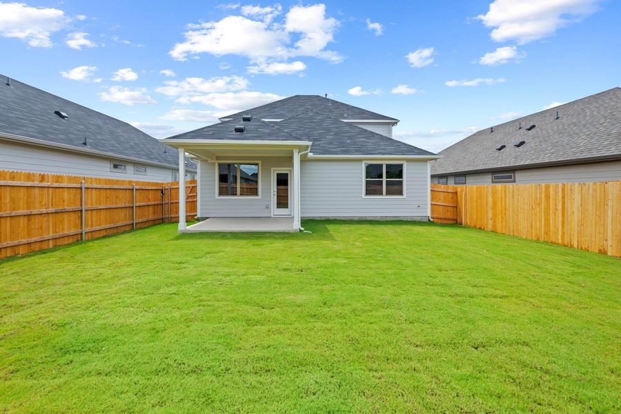 Exterior details and patio area of a home in Prairie Winds, Hutto (Image 3).