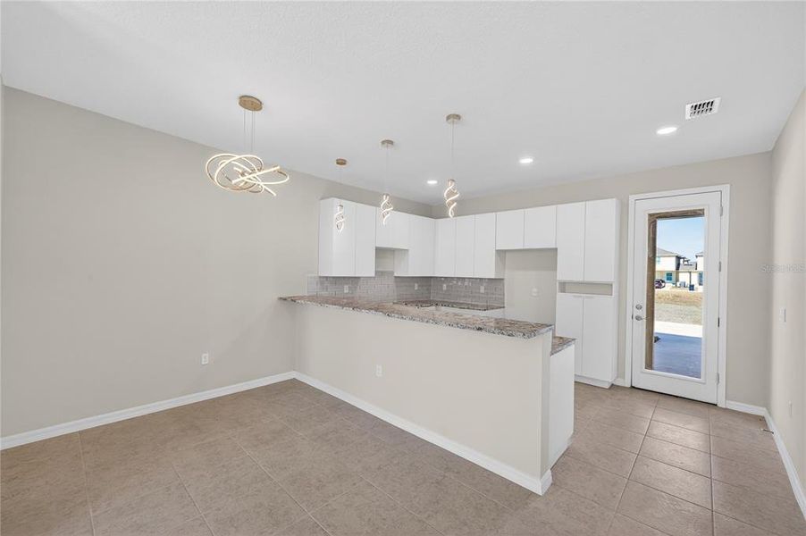 Furnished interior view inside a new home in , Davenport (Image 11).