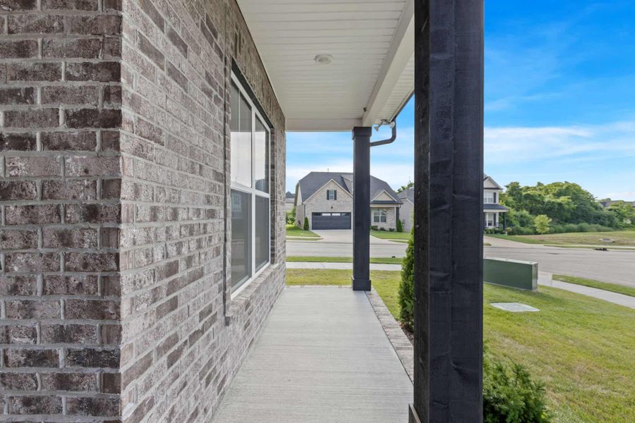 Exterior details and patio area of a home in The Paddock Courtyard, Bungalow, & Villa Homes, Gallatin (Image 2). Exterior details and patio area of a home in The Paddock Courtyard, Bungalow, & Villa Homes, Gallatin (Image 2).