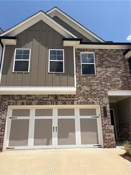 Front exterior of a new home in , Oakwood, GA, highlighting curb appeal (Image 2). Front exterior of a new home in , Oakwood, GA, highlighting curb appeal (Image 2).