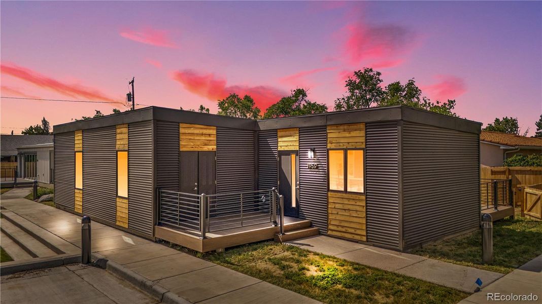 Front exterior of a new home in , Aurora, CO, highlighting curb appeal (Image 2).