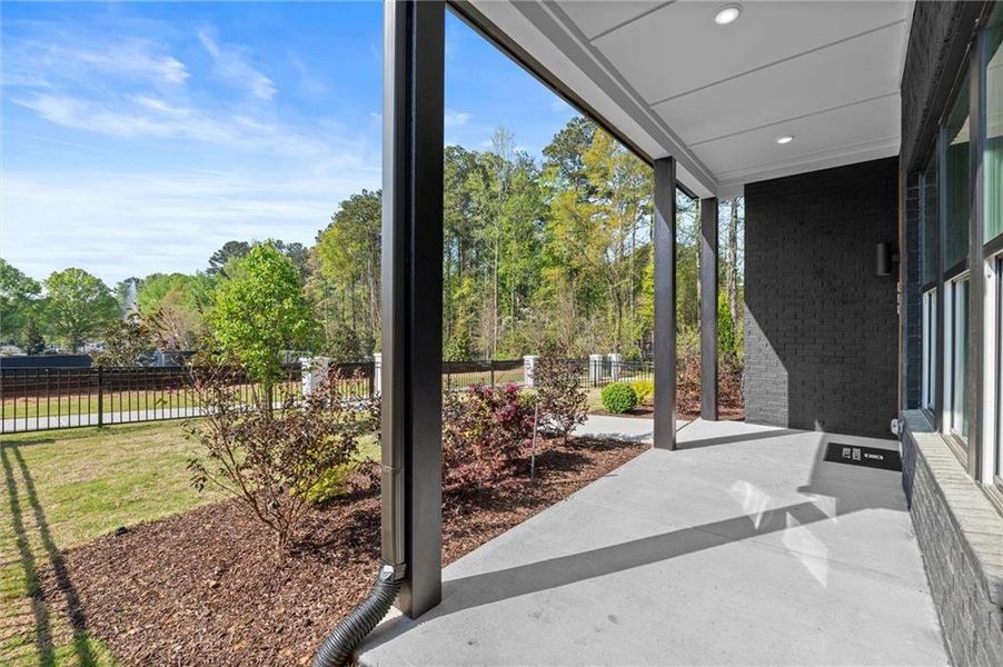 Exterior details and patio area of a home in The Gathering – Alpharetta, Alpharetta (Image 3).