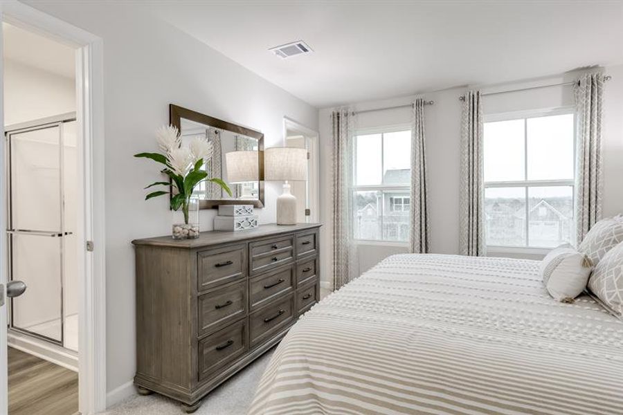 Representative furnished interior of a home built from the Tate by Ryan Homes in Middle Creek Village Coastal Cottages & Villas, Bolivia (Image 16).