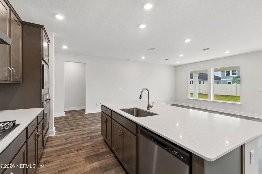 Furnished interior view inside a new home in Tributary 50', Yulee (Image 5).