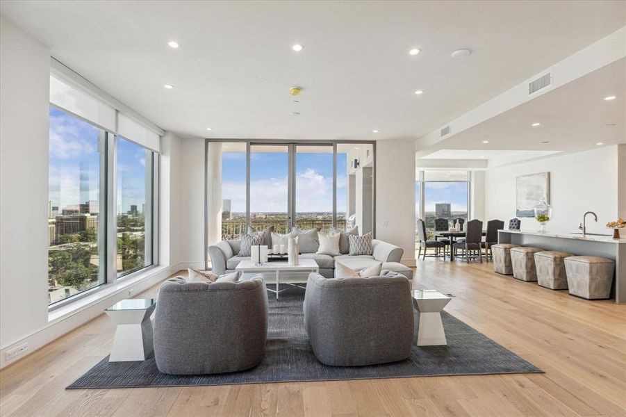 Spacious family room opens to the kitchen for great views and conversations.