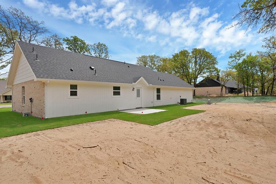 Exterior details and patio area of a home in , Poolville (Image 3).