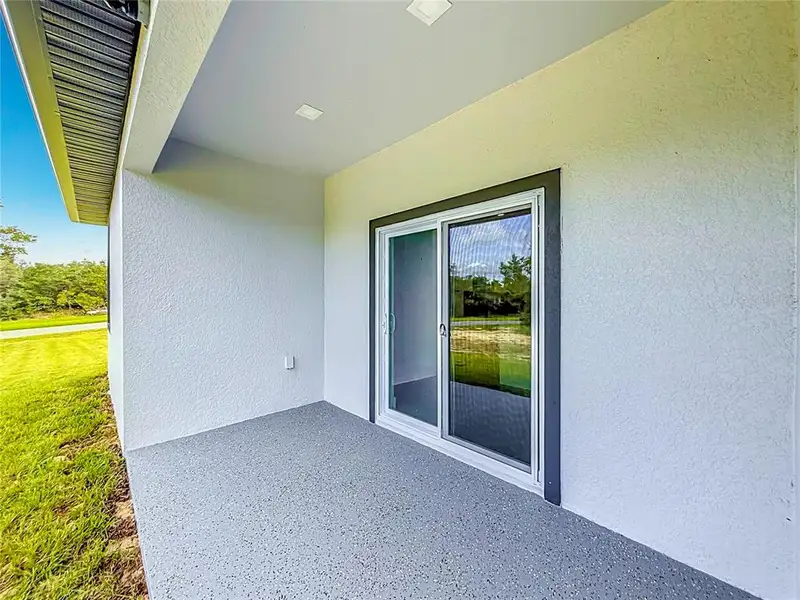 Exterior details and patio area of a home in , Ocala (Image 3).