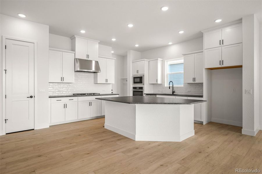 Furnished interior view inside a new home in Wolf Ranch - Enclave Collection, Colorado Springs (Image 7).
