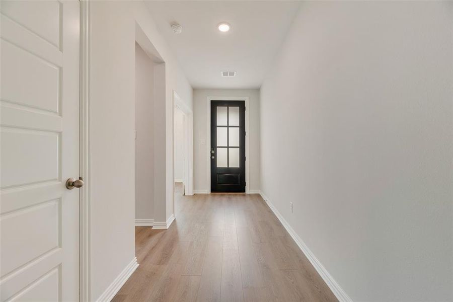 Spacious, unfurnished interior of a new home in Valencia On The Lake, Little Elm (Image 33). Spacious, unfurnished interior of a new home in Valencia On The Lake, Little Elm (Image 33).