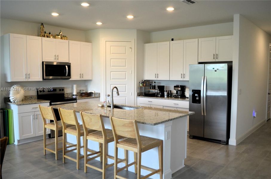 Furnished interior view inside a new home in , Port St. Lucie (Image 8).