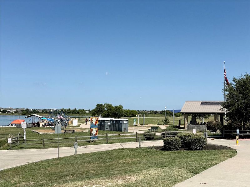 View of home's community featuring a lawn View of home's community featuring a lawn