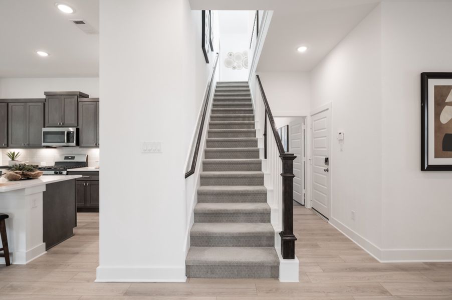 Representative furnished interior of a home built from the Wren by Tri Pointe Homes in Oakhill Reserve, Tomball (Image 25).
