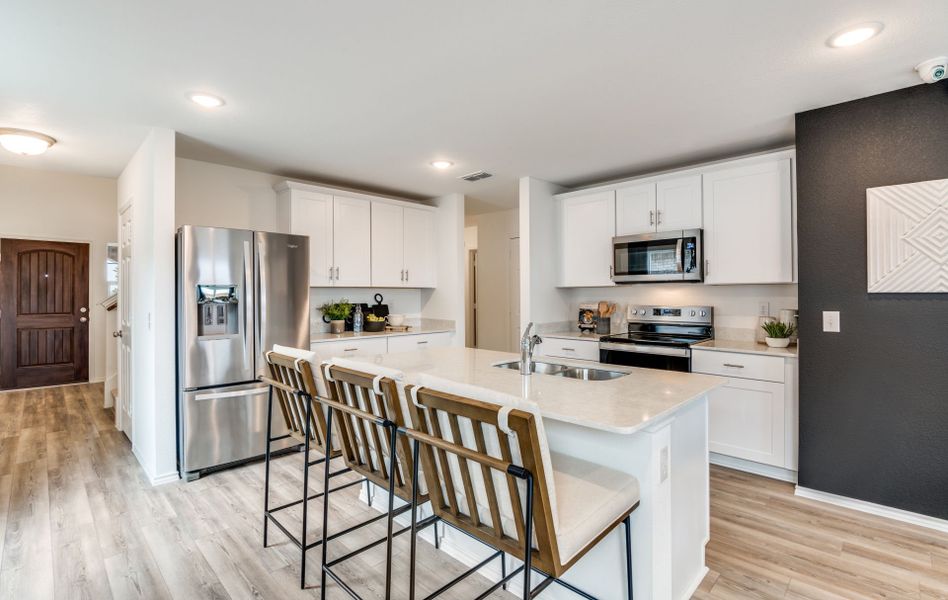 Spacious kitchen with recessed lighting