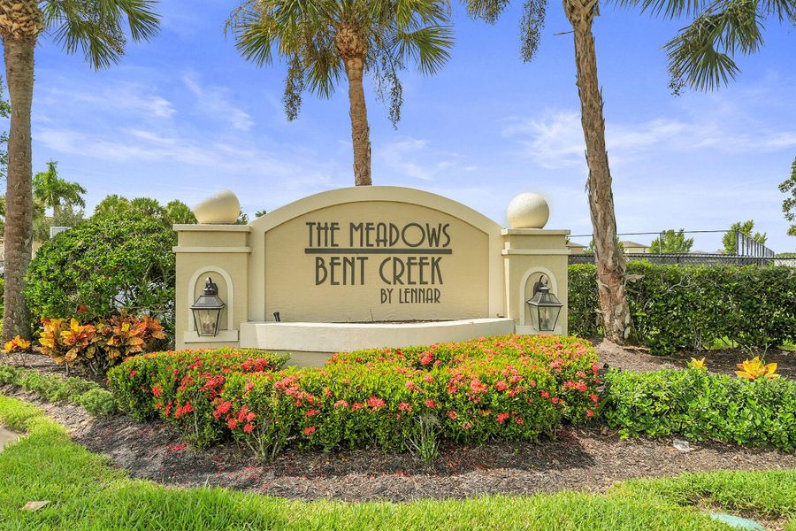 Front exterior of a new home in Bent Creek: The Meadows Collection, Fort Pierce, FL, highlighting curb appeal (Image 18).