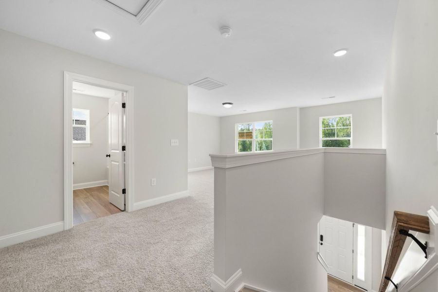 Spacious, unfurnished interior of a new home in Cottages at Piper Village, Trinity (Image 26).