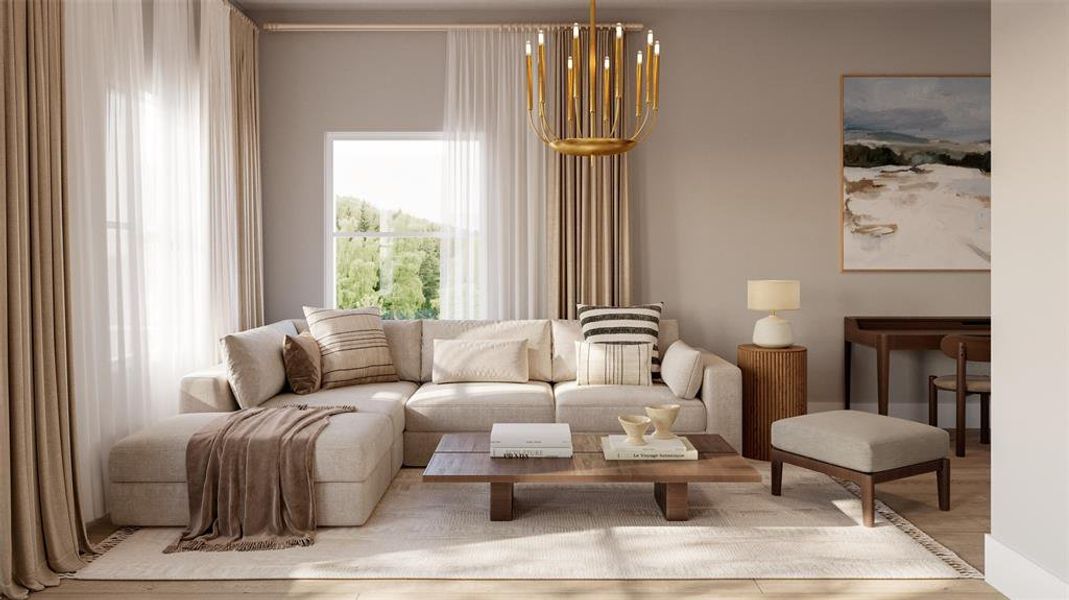 Sitting room featuring light wood-type flooring and an inviting chandelier