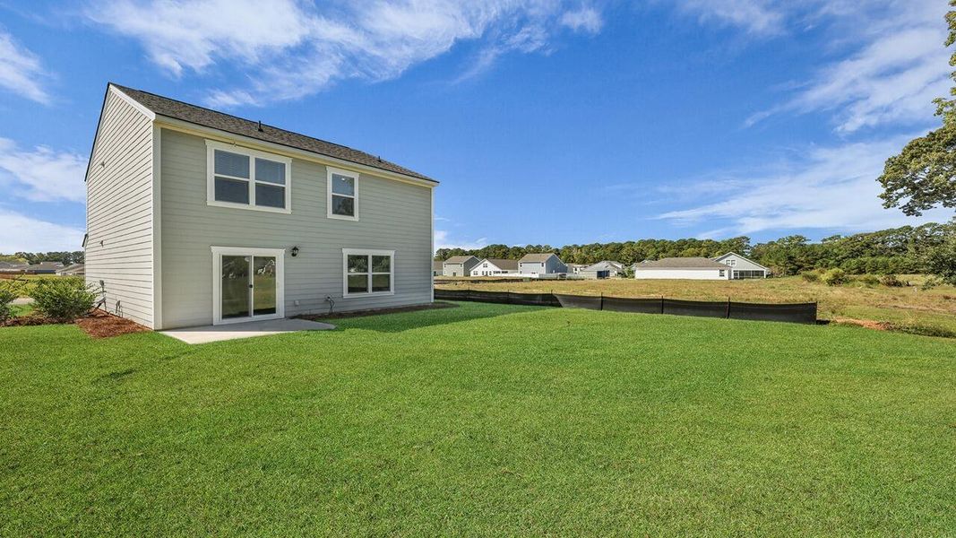 Exterior details and patio area of a home in Center Pointe, Santee (Image 21).