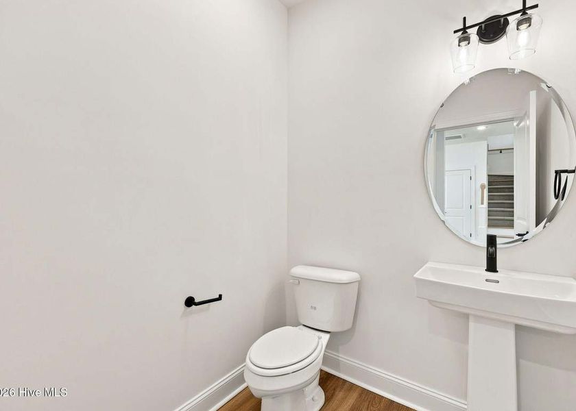 Furnished interior view inside a new home in Dixon Grove, Grimesland (Image 5).