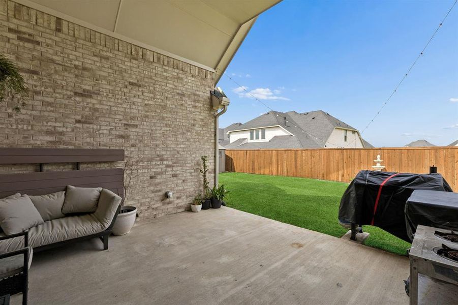 Exterior details and patio area of a home in Dominion of Pleasant Valley, Wylie (Image 3). Exterior details and patio area of a home in Dominion of Pleasant Valley, Wylie (Image 3).