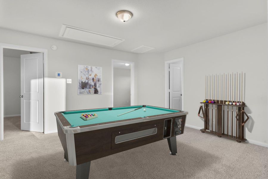 This virtually staged game room offers a spacious and flexible upstairs retreat perfect for entertaining or relaxing. With plenty of room for a pool table, media setup, or play area, it’s an ideal gathering spot for family and friends. This virtually staged game room offers a spacious and flexible upstairs retreat perfect for entertaining or relaxing. With plenty of room for a pool table, media setup, or play area, it’s an ideal gathering spot for family and friends.