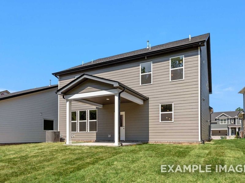 Exterior details and patio area of a home in Woods Crossing, Gallatin (Image 33).