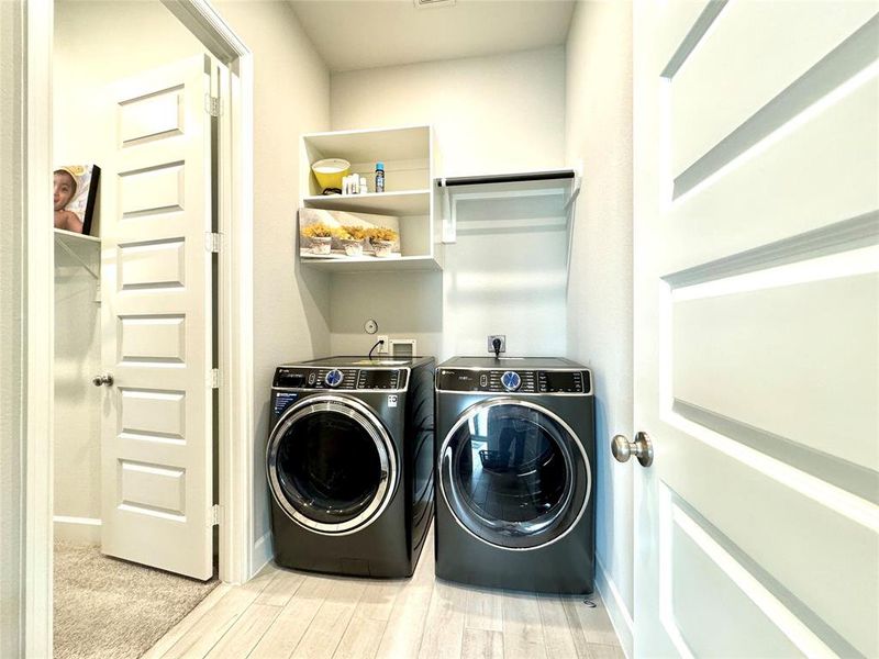 Utility Room w/Direct access to the primary suite