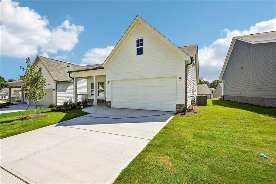 Front exterior of a new home in Villages at Cedar Hill, Dallas, GA, highlighting curb appeal (Image 22).