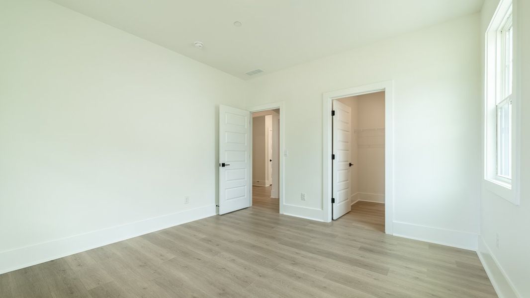 Representative unfurnished interior of a home built from the Hanover by D.R. Horton in The Village at Sandy Plains, Marietta (Image 16).