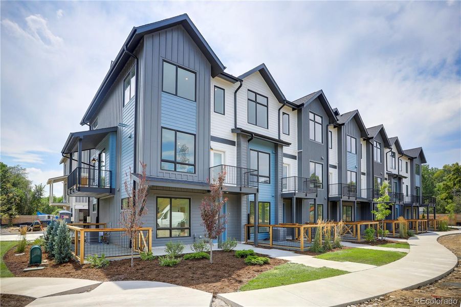 Front exterior of a new home in , Arvada, CO, highlighting curb appeal (Image 20).