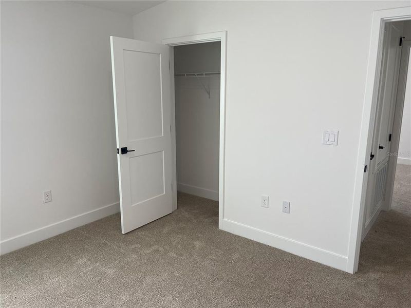 Spacious, unfurnished interior of a new home in Harmony Central, St. Cloud (Image 10).