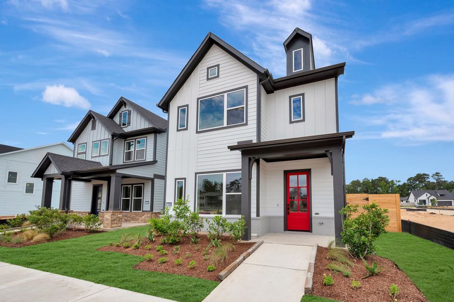 Front exterior of a new home in Two Step Farm - Cottages Row Collection, Montgomery, TX, highlighting curb appeal (Image 24).