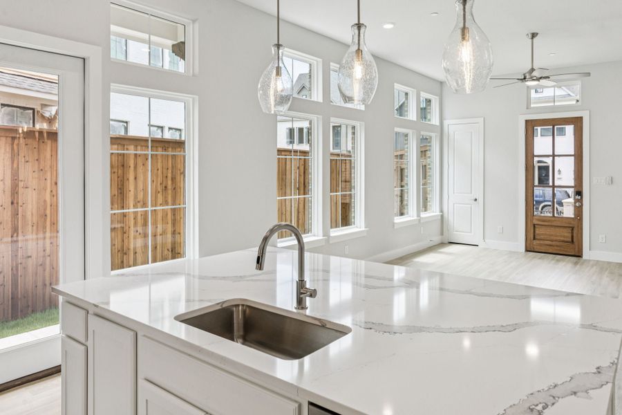 Representative furnished interior of a home built from the Hamilton by Centre Living Homes in Newman Village Townhomes, Frisco (Image 7).